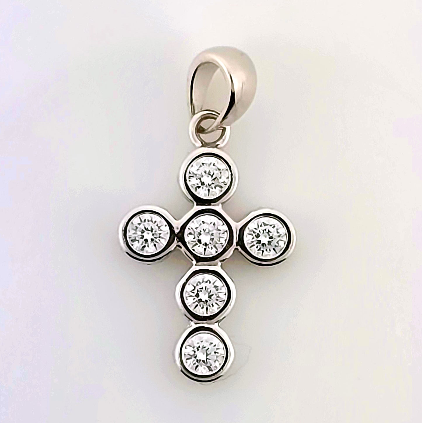 Six Round Small Diamond Cross