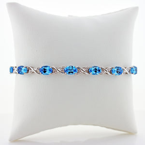 BLUE TOPAZ 10K WG  TENNIS BRACELET