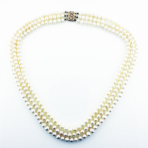 TRIPLE STRAND PEARL NECKLACE