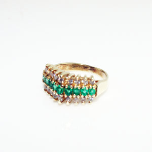 ROUND DIAMOND AND EMERALD RING